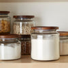 Anchor Hocking Montana glass canisters with acacia lids close up Danielle Walker