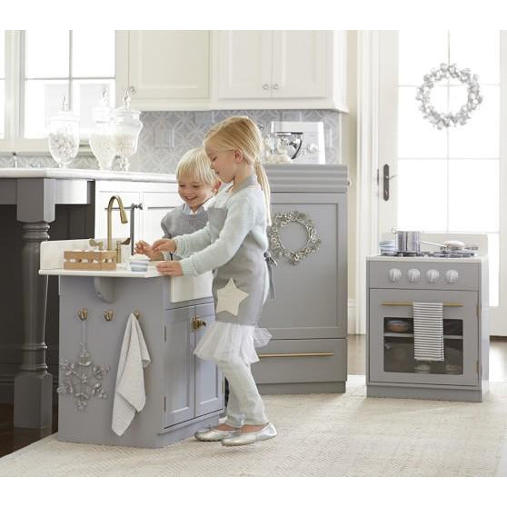 Chelsea play kitchen collection with children playing Danielle Walker 
